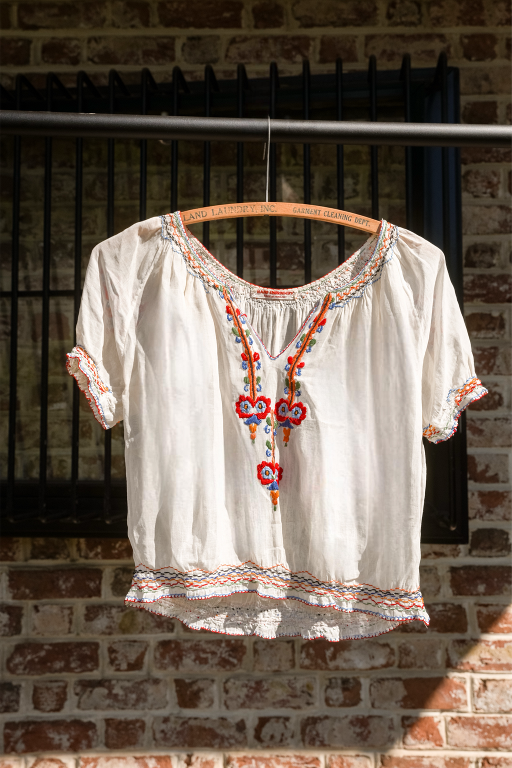 1930s Hungarian embroidered blouse with traditional folk stitching and antique silhouette