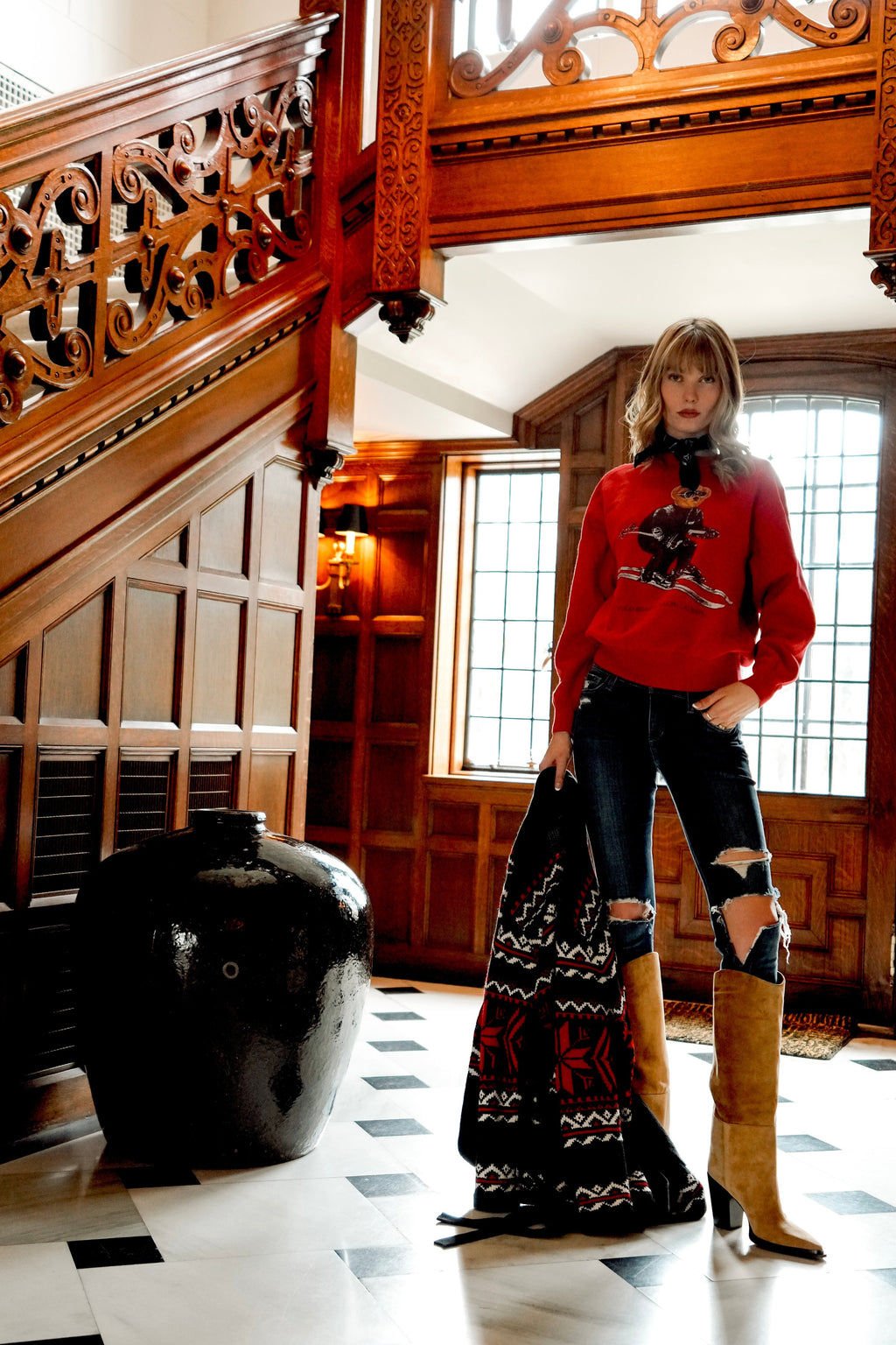 90s red Polo Ralph Lauren Ski Bear sweatshirt worn by a model.