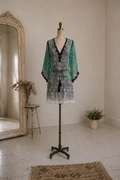 Vintage Calypso St. Barth green printed silk mini dress with embroidered trim and tassel tie detail