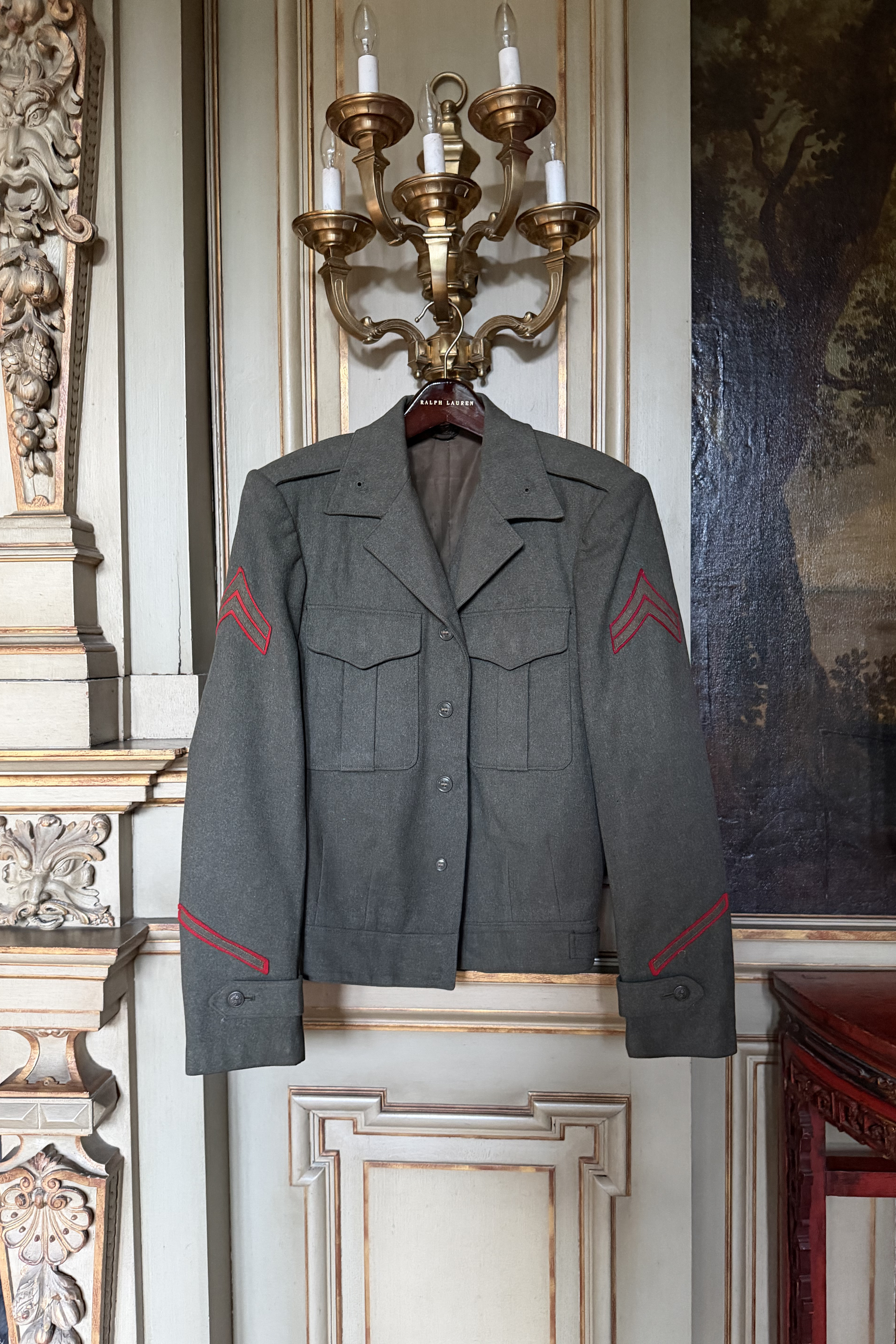 Front view of vintage USMC wool Vandegrift military jacket with pleated chest pockets