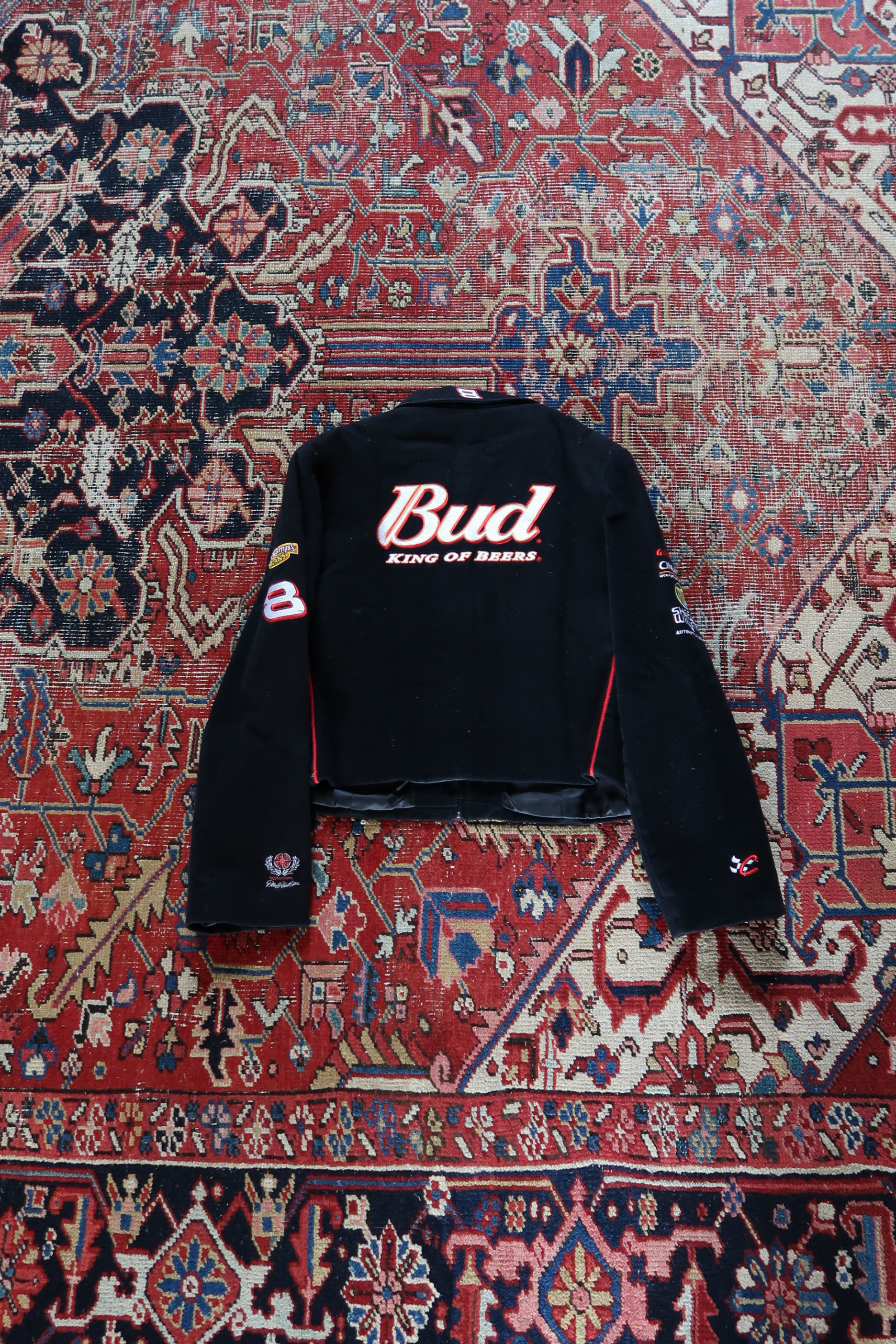 Back of vintage Dale Earnhardt Jr Budweiser NASCAR jacket with large embroidered Bud King of Beers logo