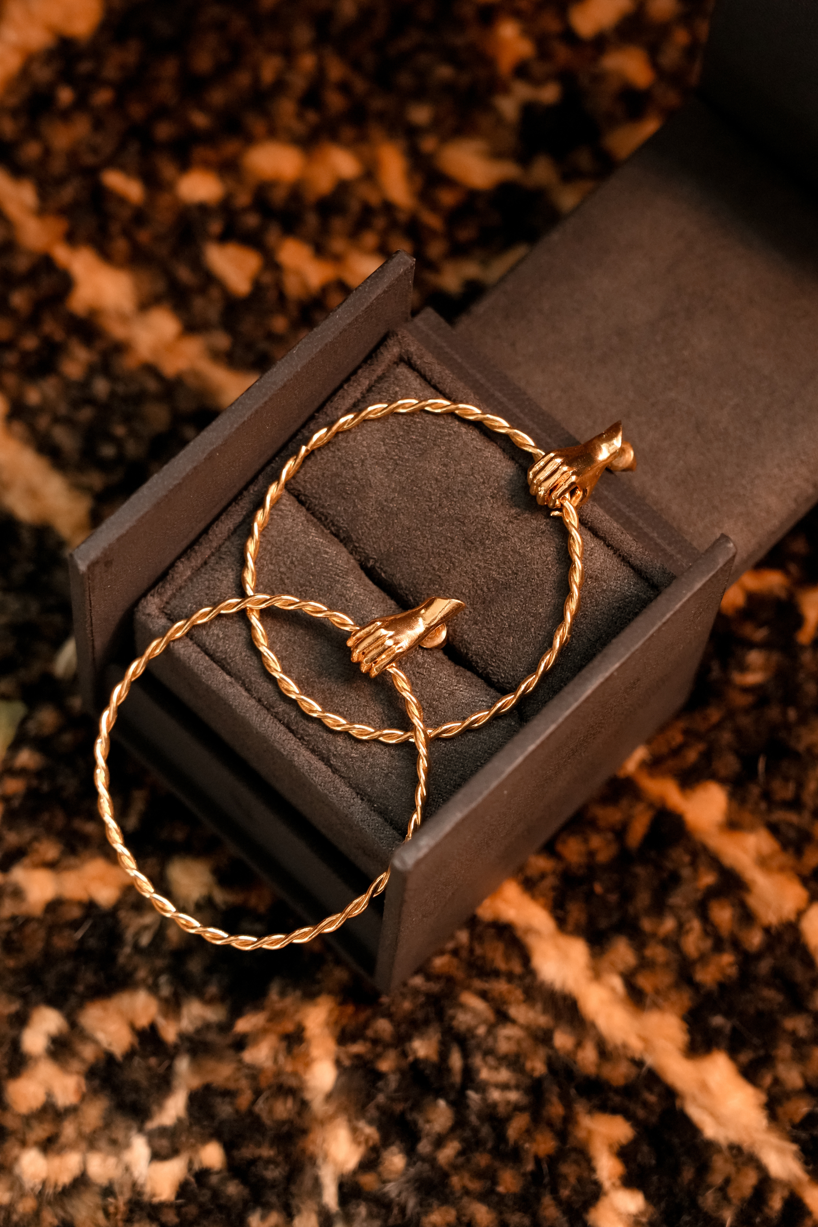 Gilded Hand Twist Hoop Earrings