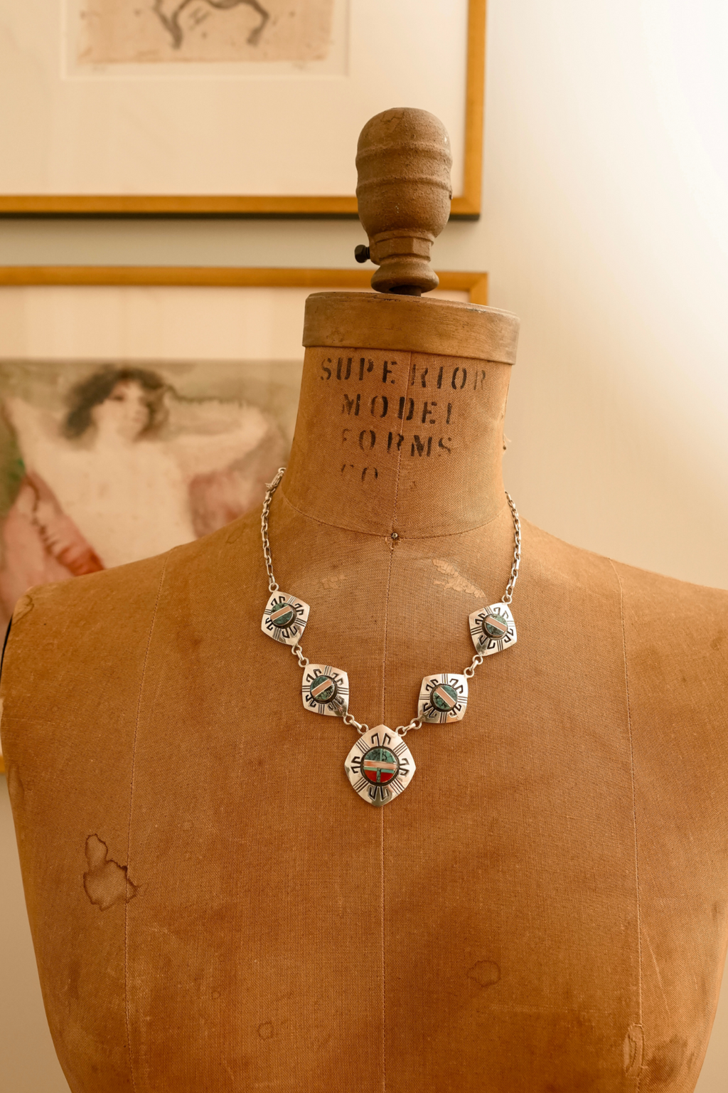 Vintage Zuni Native American sterling silver multi-stone inlay geometric medallion necklace.