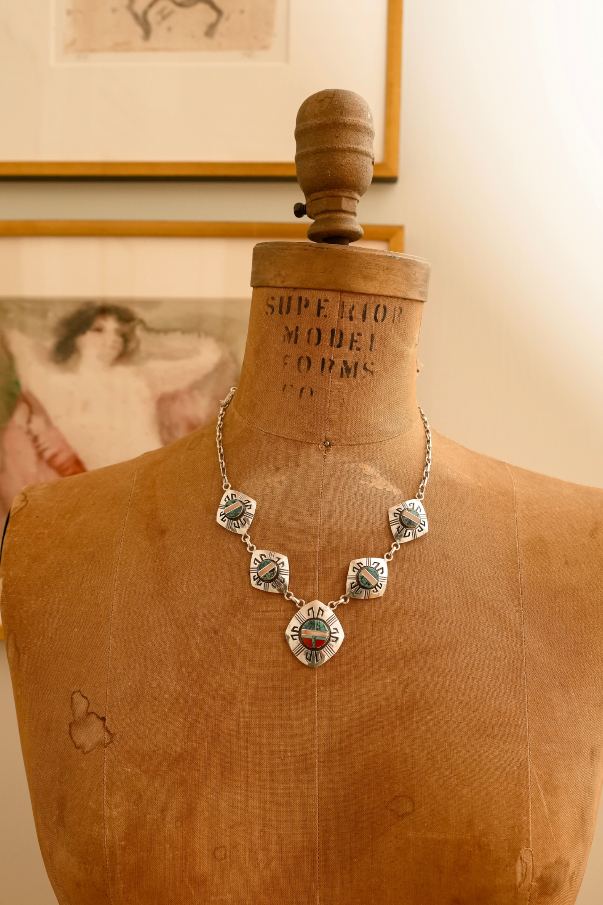 Vintage Zuni Native American sterling silver multi-stone inlay geometric medallion necklace.